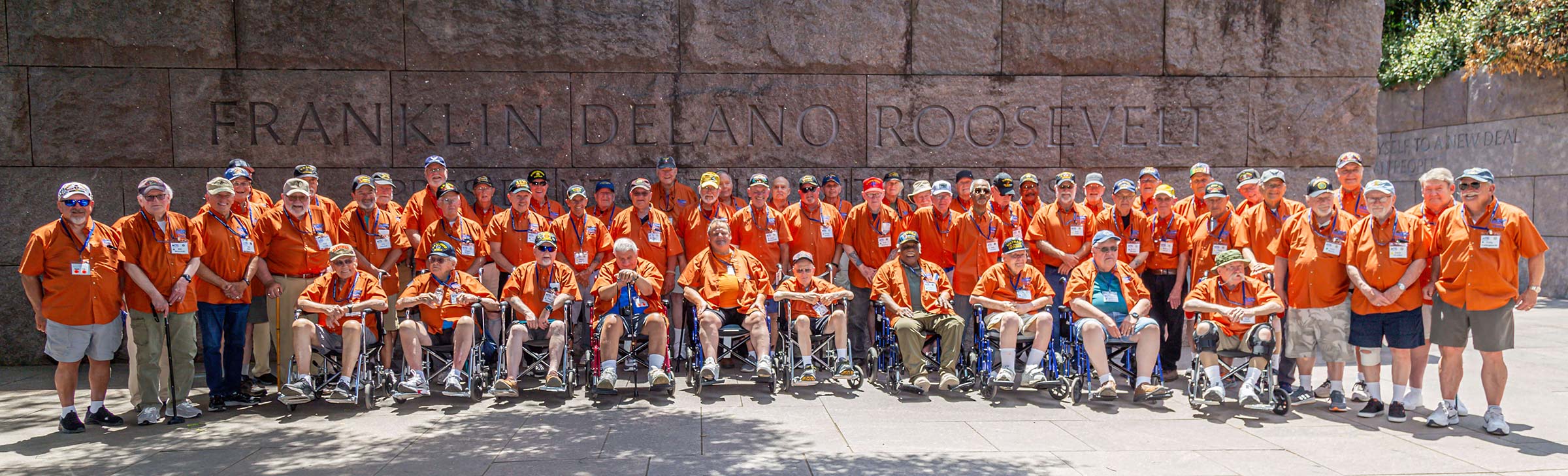 Group of veterans and guardians in front of the Roosevelt Memorial